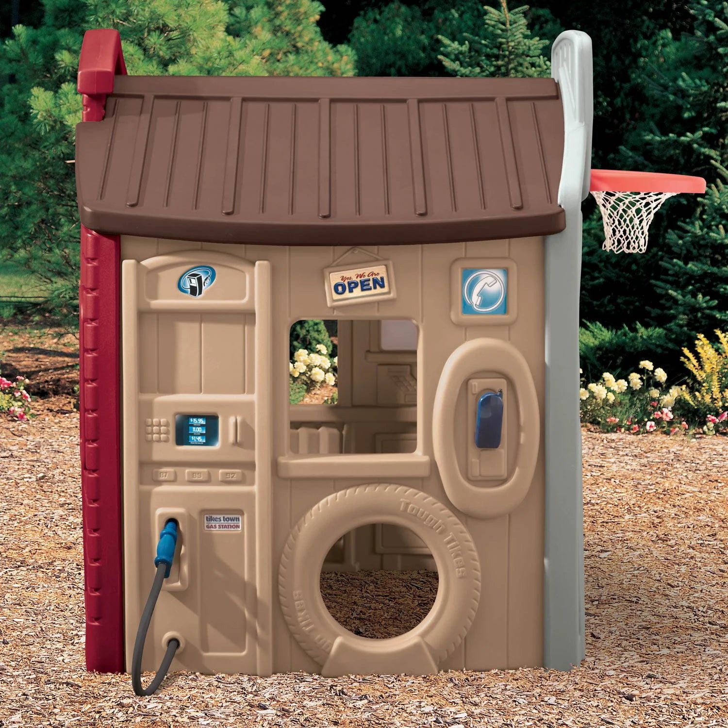 Children's red and tan playhouse playset with front panel door, window, and tire