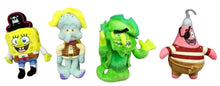 Four glow-in-the-dark pirate plush figures: SpongeBob, red-striped, pale, and green alligator