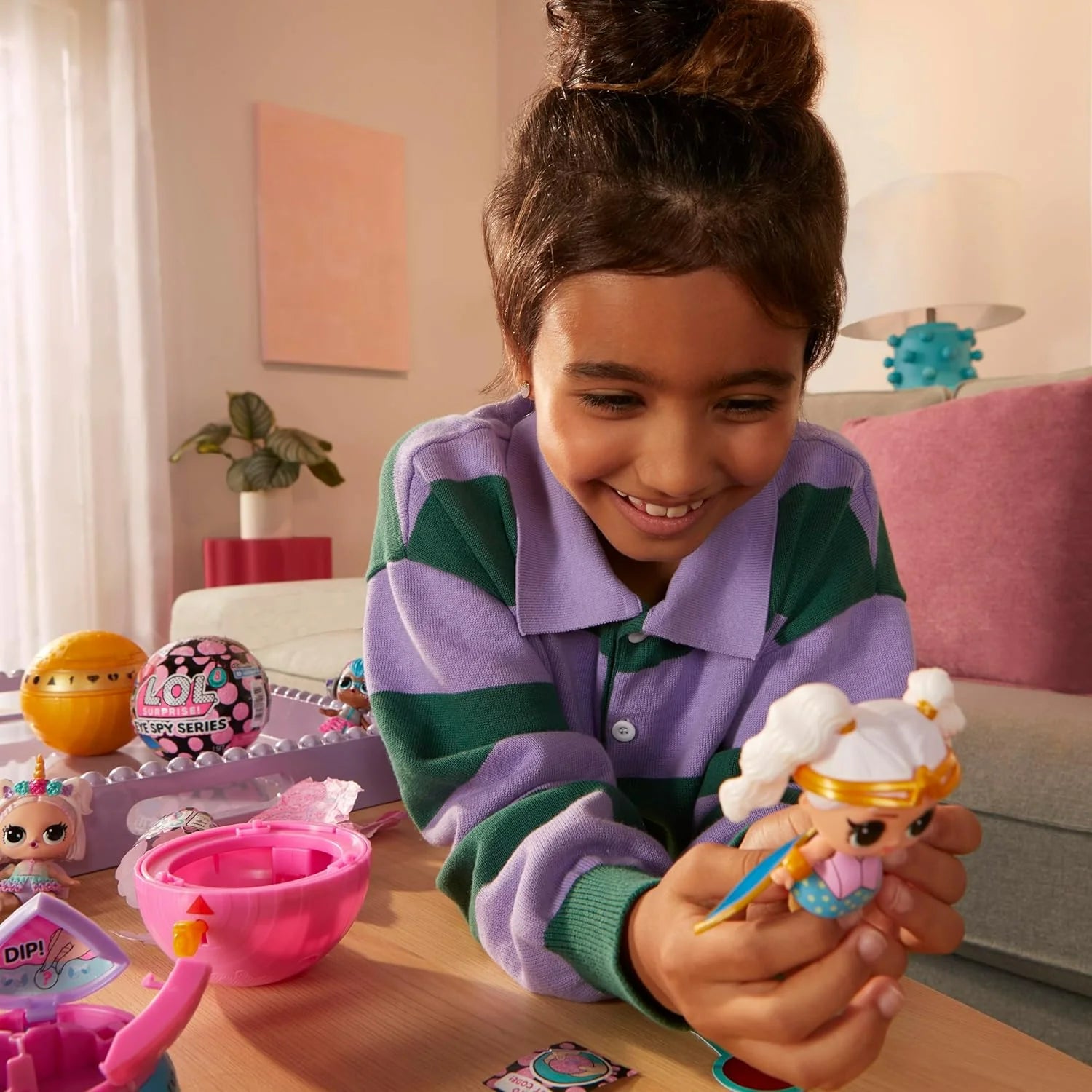 Eye Spy Tots figure with blue star outfit and wand accessory