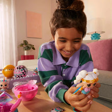 Eye Spy Tots figure with blue star outfit and wand accessory