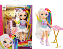 Amaya fashion doll holding a keyboard, colorful rainbow hair and rock outfit