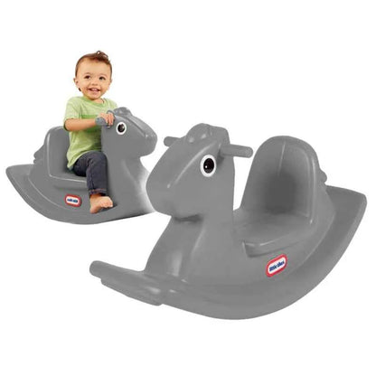 Light gray rocking horse toy with child seated on top, side view