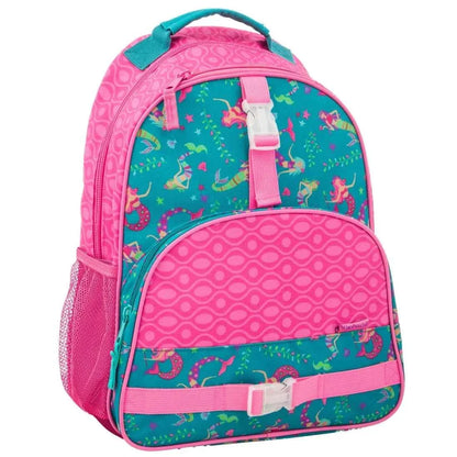 Kids backpack in pink and teal with dinosaur-style all-over print; front zip closure.