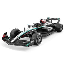 1:12 remote-control F1 car in black and teal, angled view with wheels