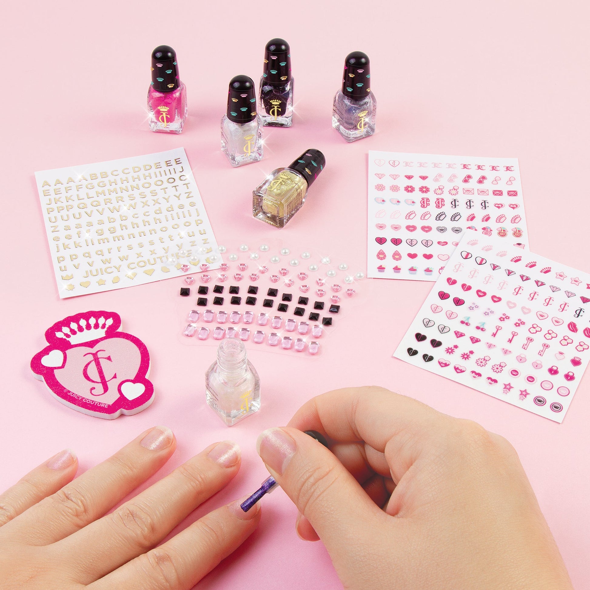Dazzling Designs manicure set with nail polish bottles, gem tiles, and sticker sheets