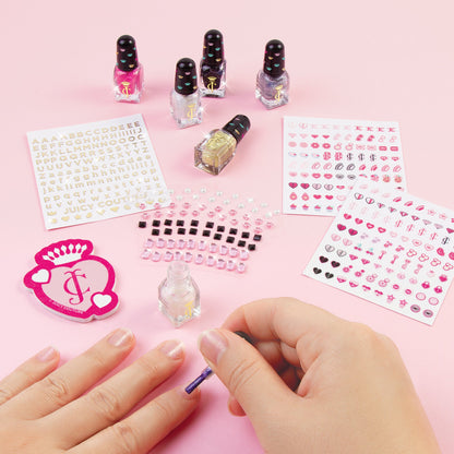 Dazzling Designs manicure set with nail polish bottles, gem tiles, and sticker sheets