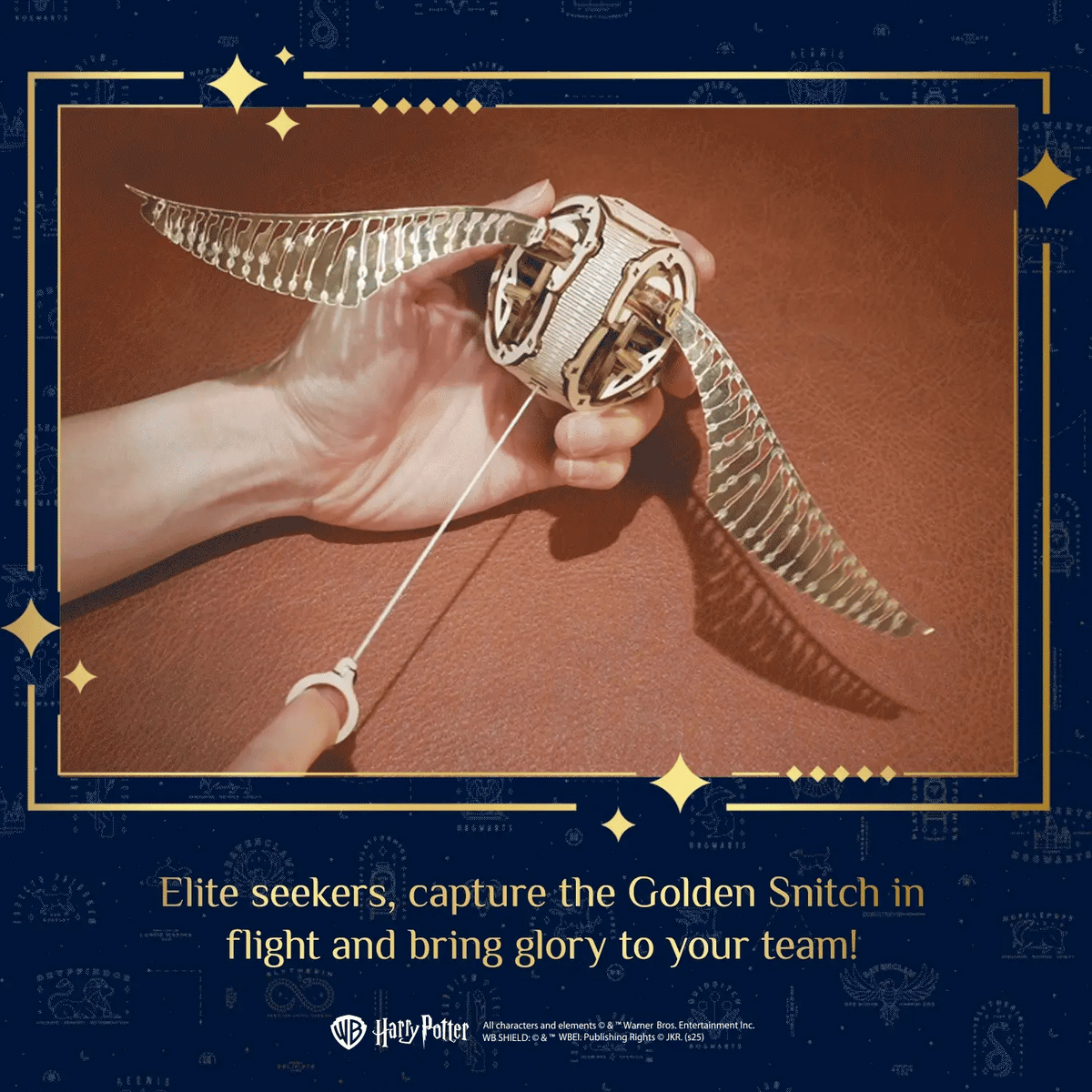 Wooden Golden Snitch craft model with hinged wings and clockwork detail