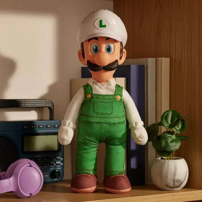 Luigi plush figure in green overalls with white cap and green L, brown shoes