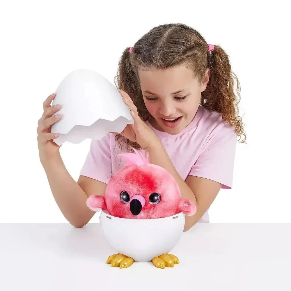 White egg-shaped plush toy with pink bird face and black beak; gold feet