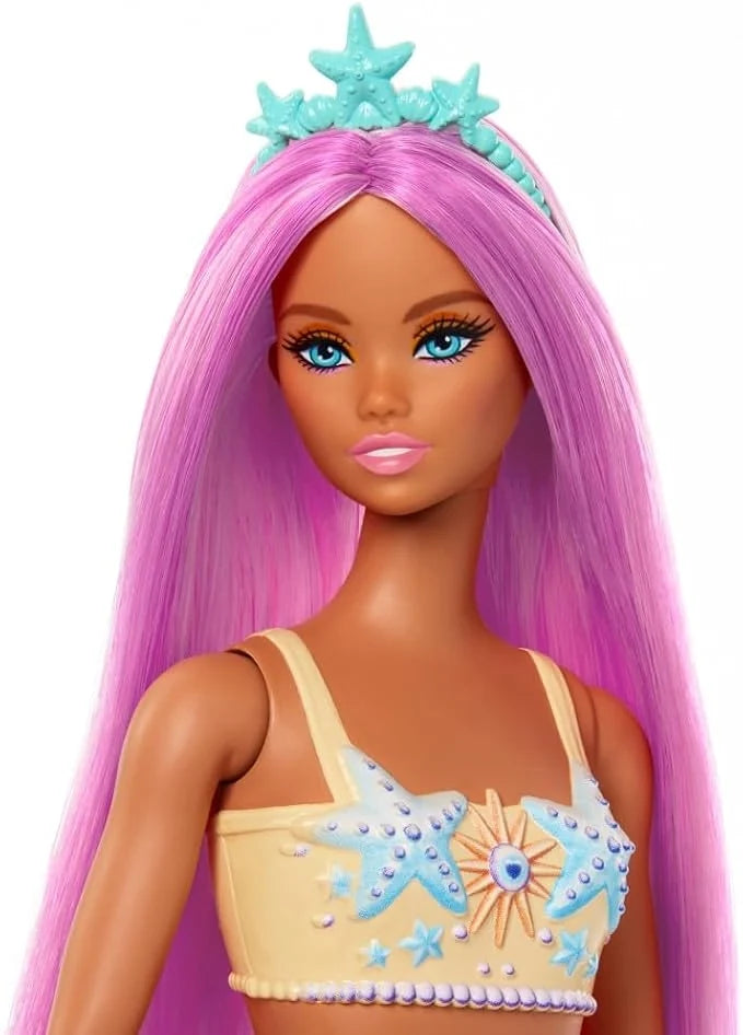 Barbie mermaid doll with long purple hair, turquoise star crown, blue star top