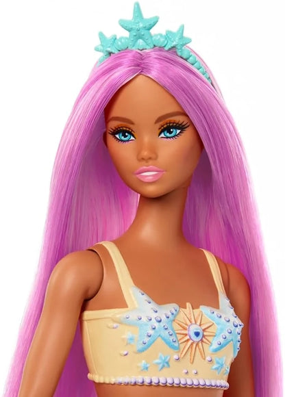 Barbie mermaid doll with long purple hair, turquoise star crown, blue star top