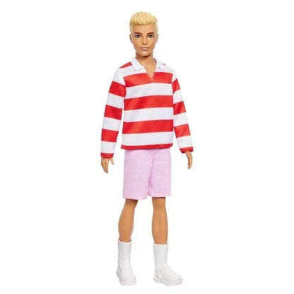 Doll in red-and-white striped polo shirt, pink shorts, white socks and boots