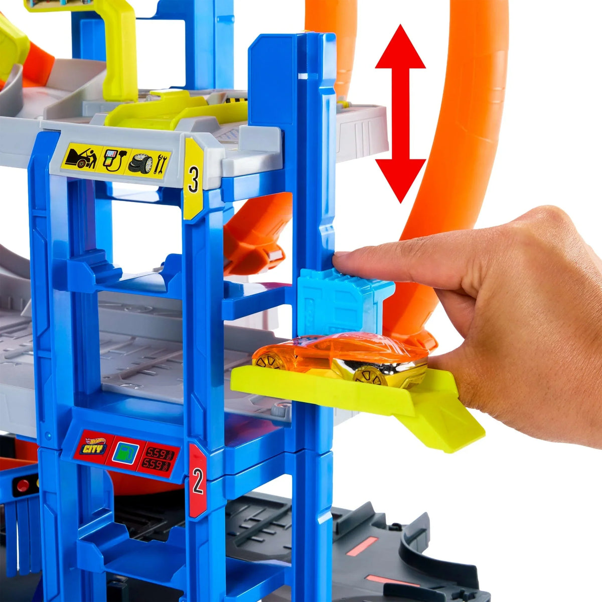 Mega Loop Garage toy garage playset with track, cars, and hand on a platform