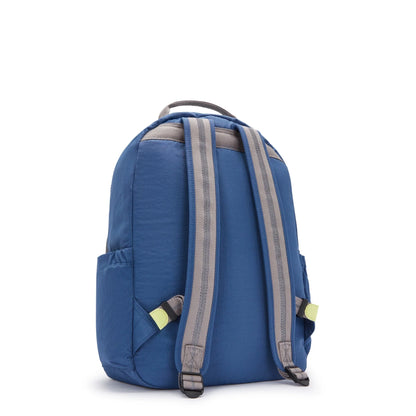 Large blue backpack from the side with adjustable straps and side storage pocket