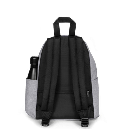 Black mini backpack with grey side panels, padded straps, and bottle pocket