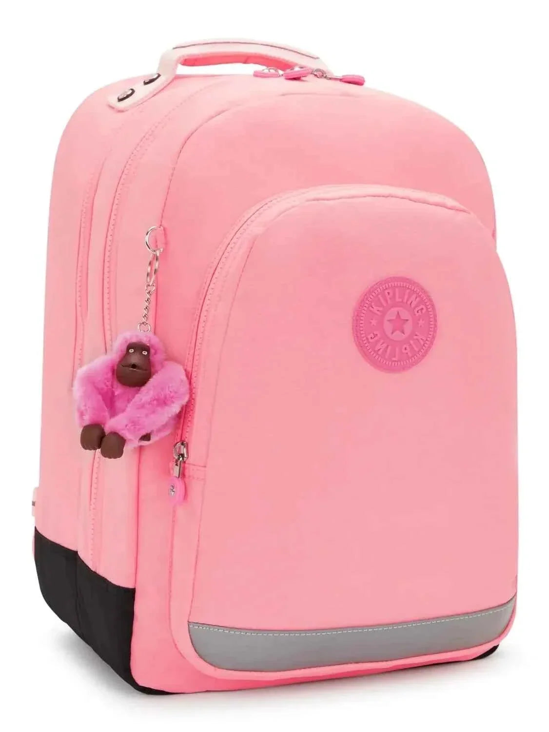 Pink mini backpack with front zipper, Kipling logo badge, and pom-pom keychain