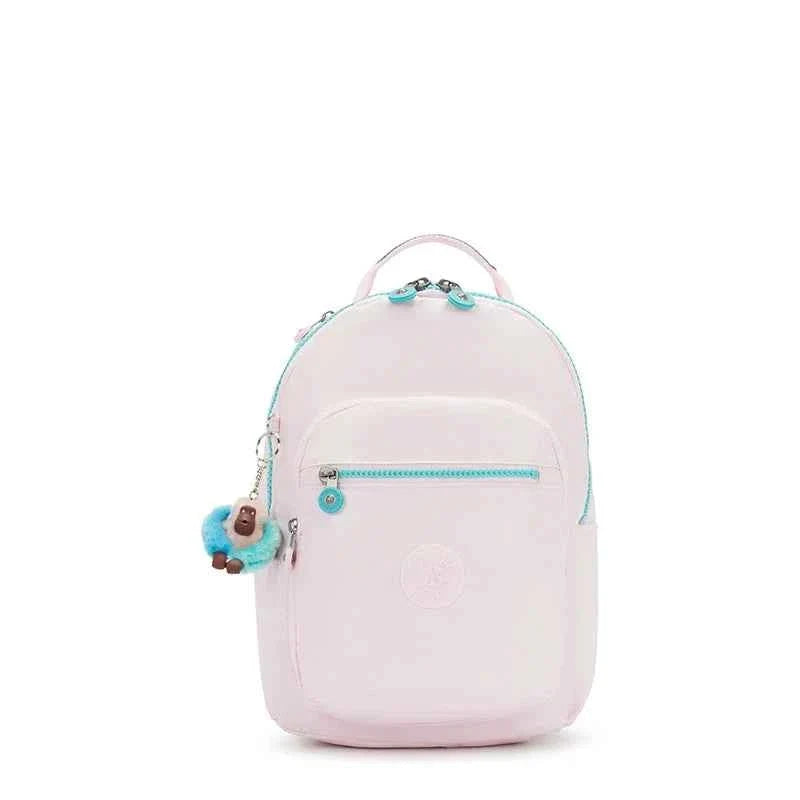Seoul S mini backpack front view, pale pink with teal zipper and hanging plush charm