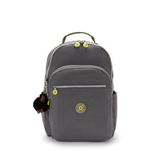 Grey Kipling backpack with front zip pocket, logo patch, and top handle