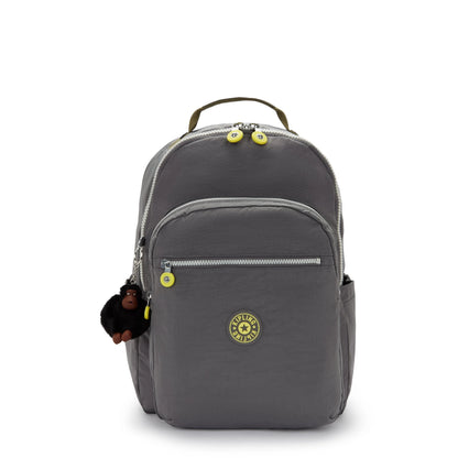 Grey Kipling backpack with front zip pocket, logo patch, and top handle