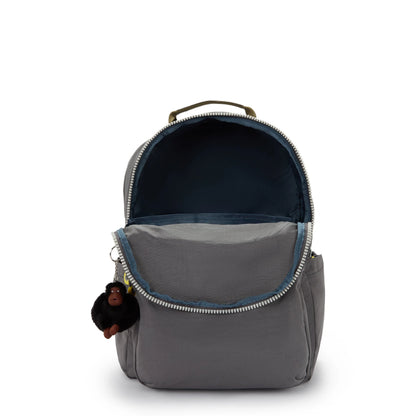 Grey Kipling backpack with open top and navy interior lining