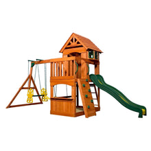 Wood swing set with playhouse, green slide and bucket swings