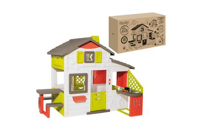 Children’s playhouse kitchen toy with white walls, lime doors, red cabinets, gray roof