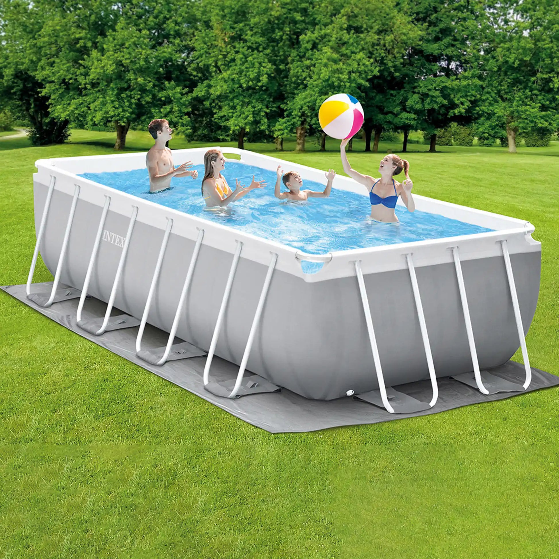 Rectangular above-ground pool with gray frame and blue water, kids playing inside