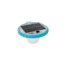 Solar-powered LED floating pool light with blue base and clear top, black solar panel