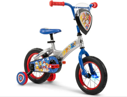 Paw Patrol 12-inch kids bike with front shield, Paw Patrol grips, and red wheel rims