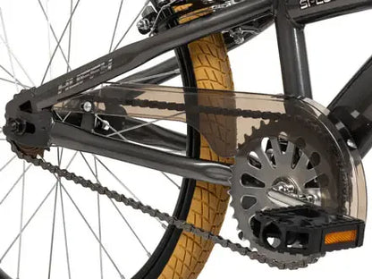 Spectre boys bike drivetrain close-up: chain, crankset, and rear wheel