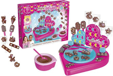 MiniDelices 5-in-1 chocolate workshop set with pink maker and chocolate mold pieces