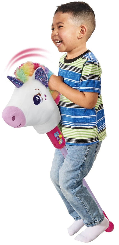 Kids playing with VTech trotting unicorn plush, rainbow mane and sparkling horn