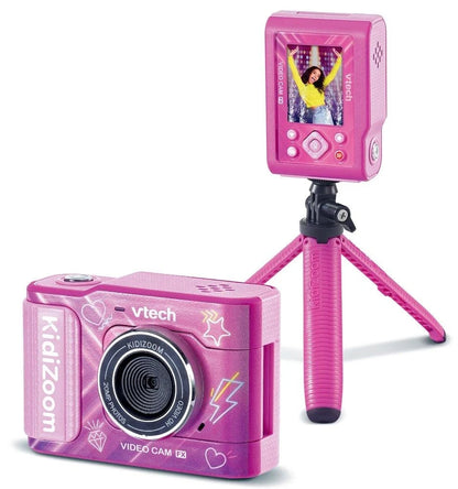 Pink VTech Kidizoom video camera rear view on tripod with heart button panel