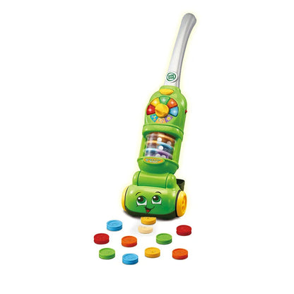 Green pick-up vacuum toy with smiling face and colorful top, plus colored counting discs