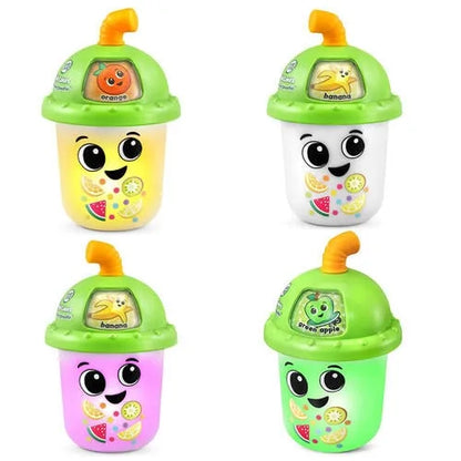 Four fruit smoothie toy cups with smiling faces and hinged green lids
