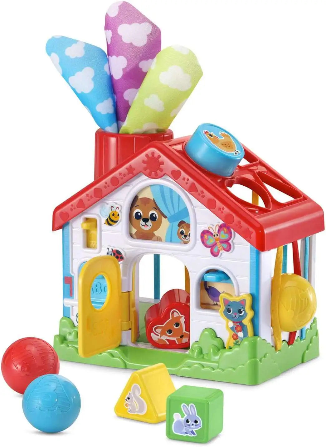 Colorful plastic playhouse toy with doors, animal faces, and sorting shapes, red roof