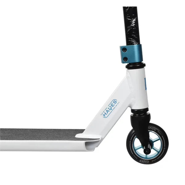 Stunt scooter front section: white frame, black fork, blue wheel, and blue clamp
