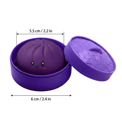 Purple round capsule with open lid and cute dumpling figure