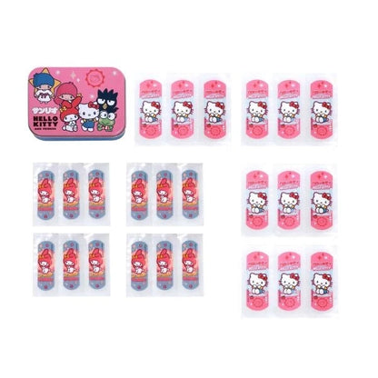 Hello Kitty friends band aid packs in pink and blue beside metal box