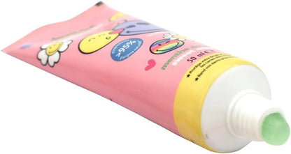 Toothpaste tube angled with mint-colored cap and pink tube with smiley icons