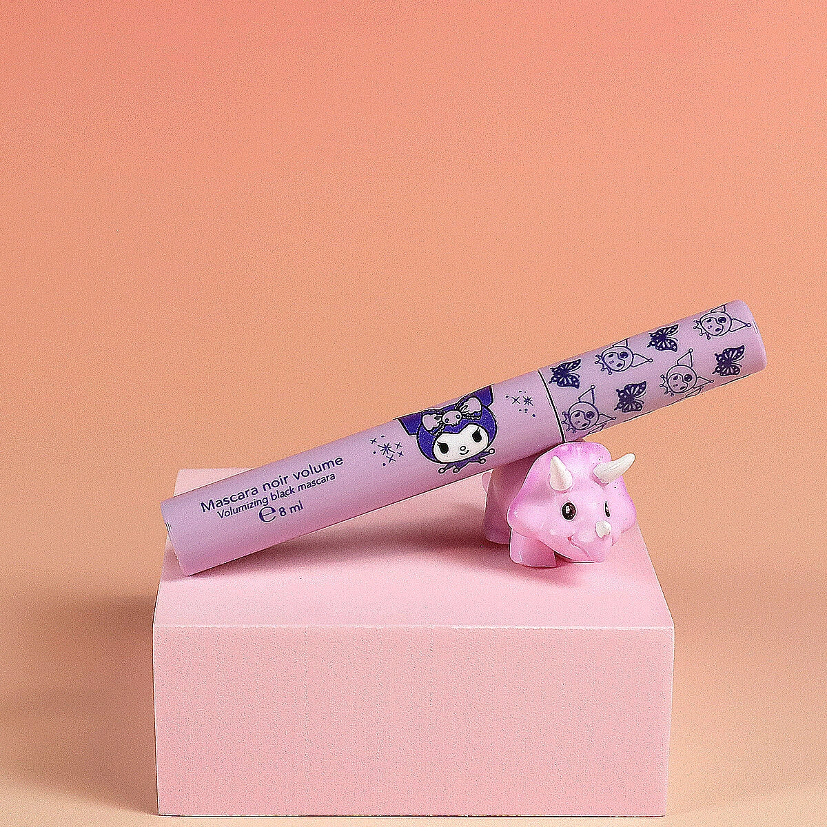 Kuromi black mascara tube on pink box with small pink character figurine