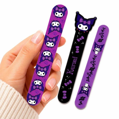 Kuromi nail files set shown in hand, purple and black with cartoon graphics