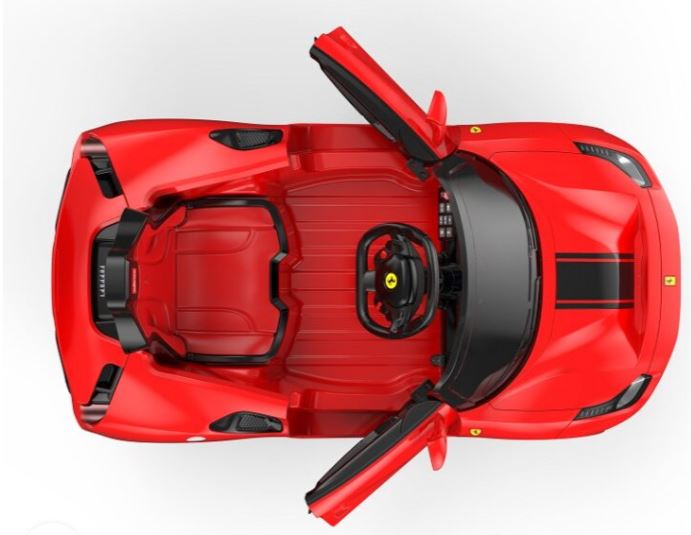 Red ride-on sports car top view with black interior and exposed steering
