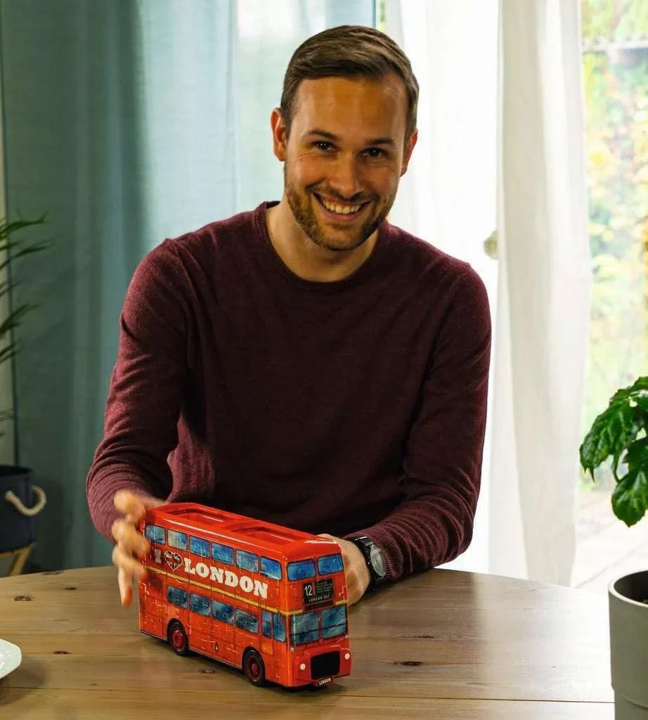 3D London bus puzzle, assembled red and blue bus model with LONDON text