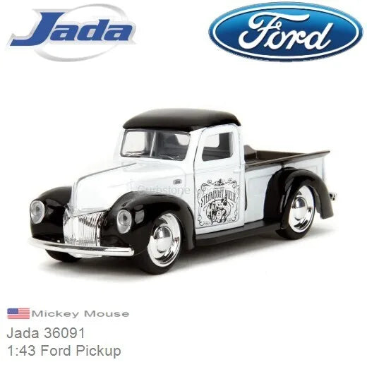 White and black die-cast pickup truck model with character graphic on door