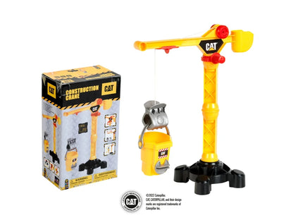 Yellow construction crane playset with gray launcher, black base pieces, and product box