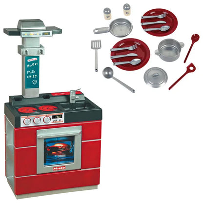 Compact play kitchen set in red with oven window, stovetop, and cookware accessories