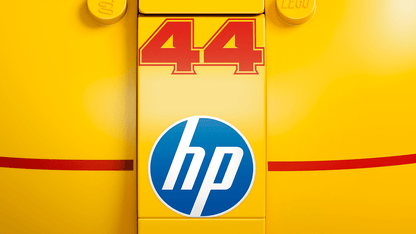 Close-up of yellow LEGO 44 hp logo graphic on the set packaging