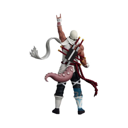 Collectible ninja figure in white outfit, arm raised, holding sword and red rope