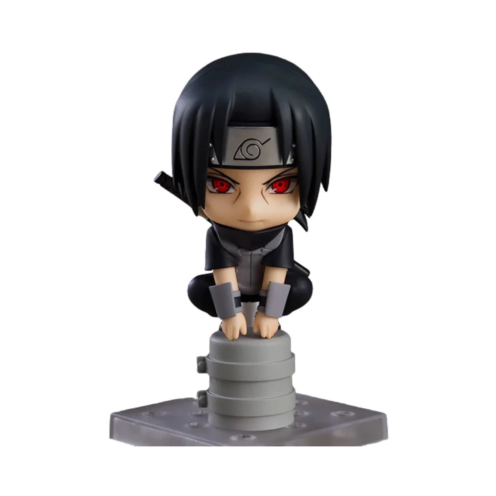 Ninja chibi action figure with black hair, red eyes, gray-and-black ANBU outfit, on base